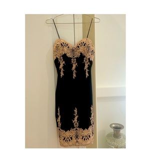 Strappy black dress w/ivory crochet detail!Beautifully wore once for a banquet